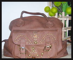 咖啡色簡潔大方的包包 商品 綠禾達(dá)人 服飾鞋包 店鋪 合肥生活門戶網(wǎng)站